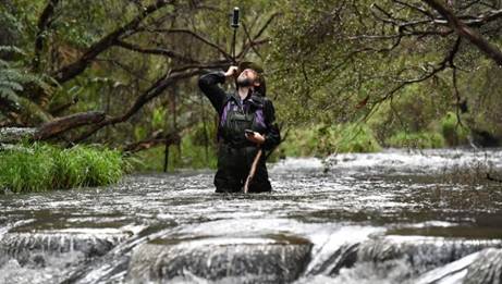 Not the muddy brown city Yarra: Christian Taylor with his camera affixed to his backpack (above his head) in the upper ...